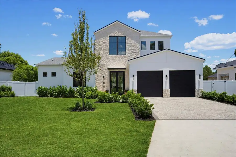Front exterior of a new home in , Winter Park, FL, highlighting curb appeal (Image 27).