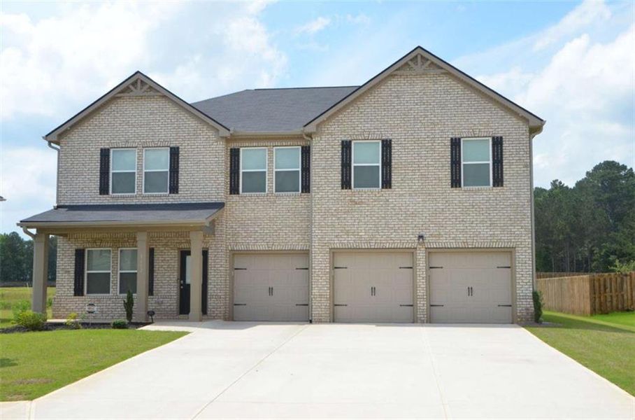 Front exterior of a new home in , McDonough, GA, highlighting curb appeal (Image 26).
