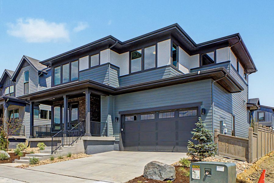 Front exterior of a new home in West Grange, Longmont, CO, highlighting curb appeal (Image 17). Front exterior of a new home in West Grange, Longmont, CO, highlighting curb appeal (Image 17).