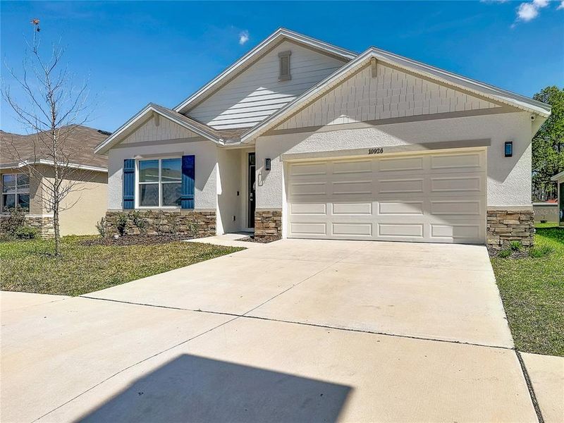 Front exterior of a new home in , San Antonio, FL, highlighting curb appeal (Image 22).