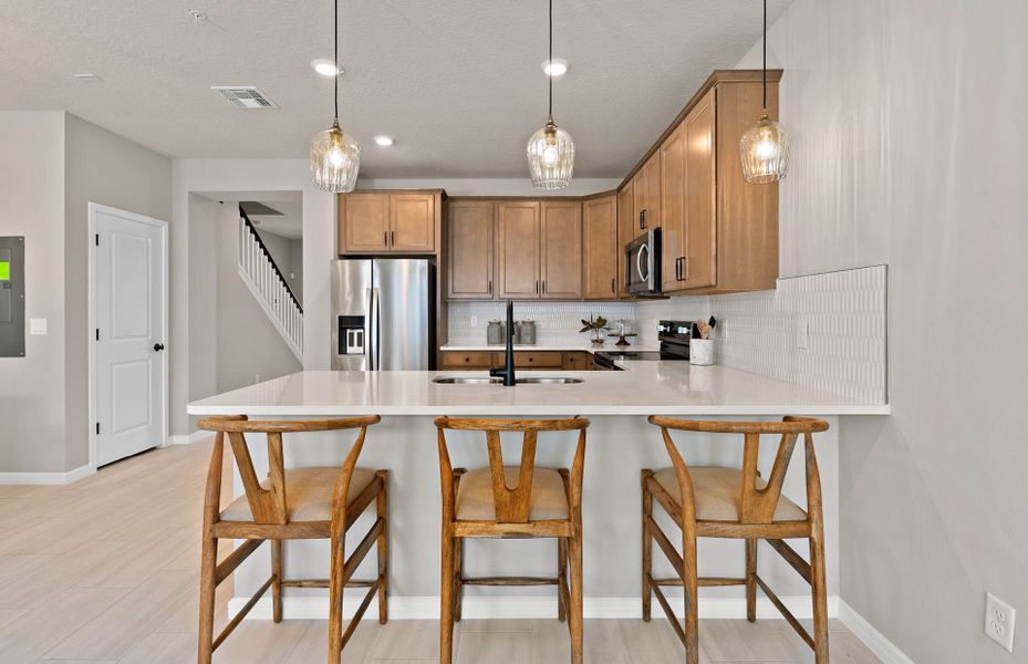 Furnished interior view inside a new home in EverBe, Orlando (Image 4).