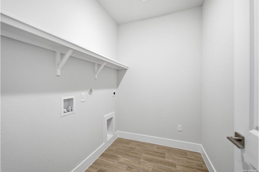 Spacious, unfurnished interior of a new home in The Woodlands at Medina Hills, Mico (Image 30).