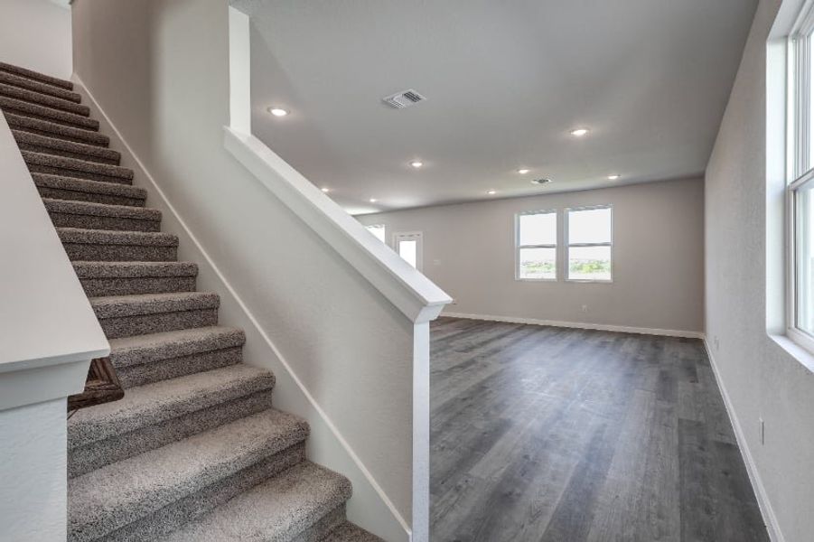 A staircase in a house. A staircase in a house.