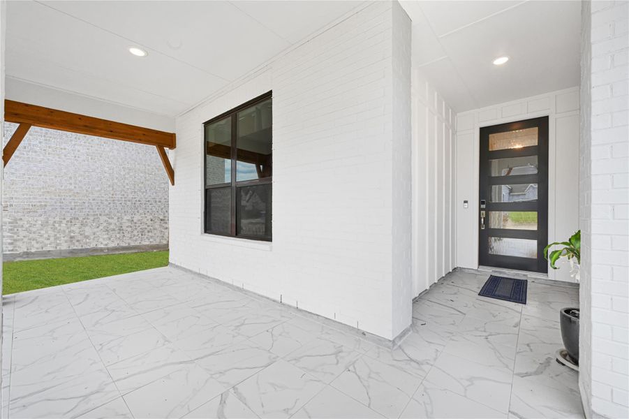 Exterior details and patio area of a home in Riceland, Mont Belvieu (Image 3).