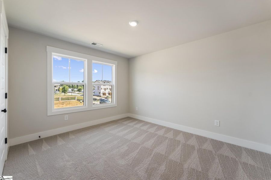 Spacious, unfurnished interior of a new home in Renaissance Place, Greenville (Image 13).