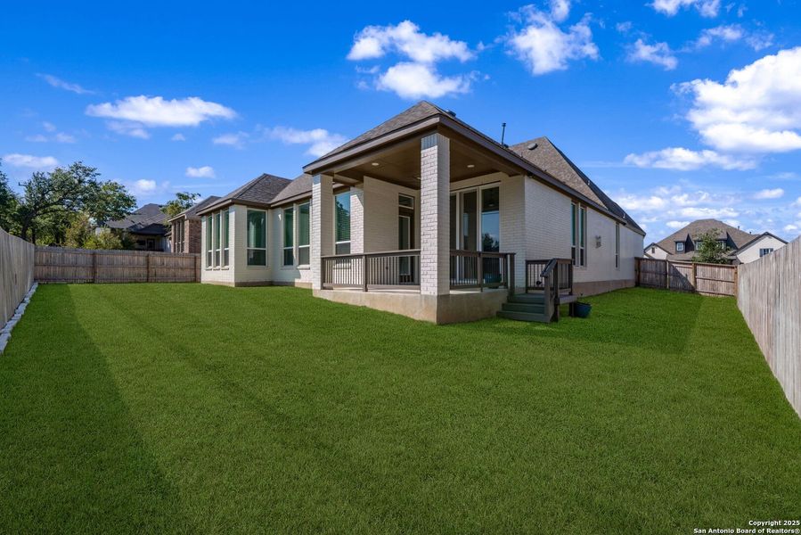 Exterior details and patio area of a home in Front Gate in Fair Oaks Ranch, Fair Oaks Ranch (Image 4). Exterior details and patio area of a home in Front Gate in Fair Oaks Ranch, Fair Oaks Ranch (Image 4).