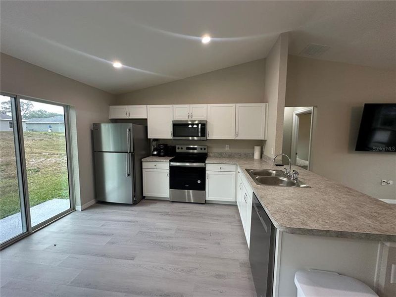 Furnished interior view inside a new home in , Dunnellon (Image 6).