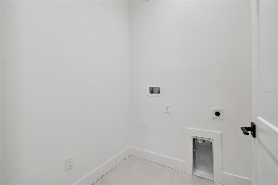 Laundry Room - Level 3 Laundry Room - Level 3