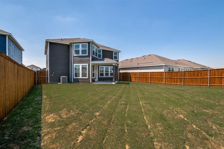 Front exterior of a new home in Cottonwood Creek, Seagoville, TX, highlighting curb appeal (Image 17).