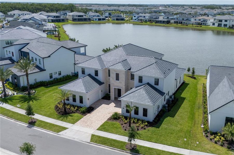Front exterior of a new home in , Orlando, FL, highlighting curb appeal (Image 28).