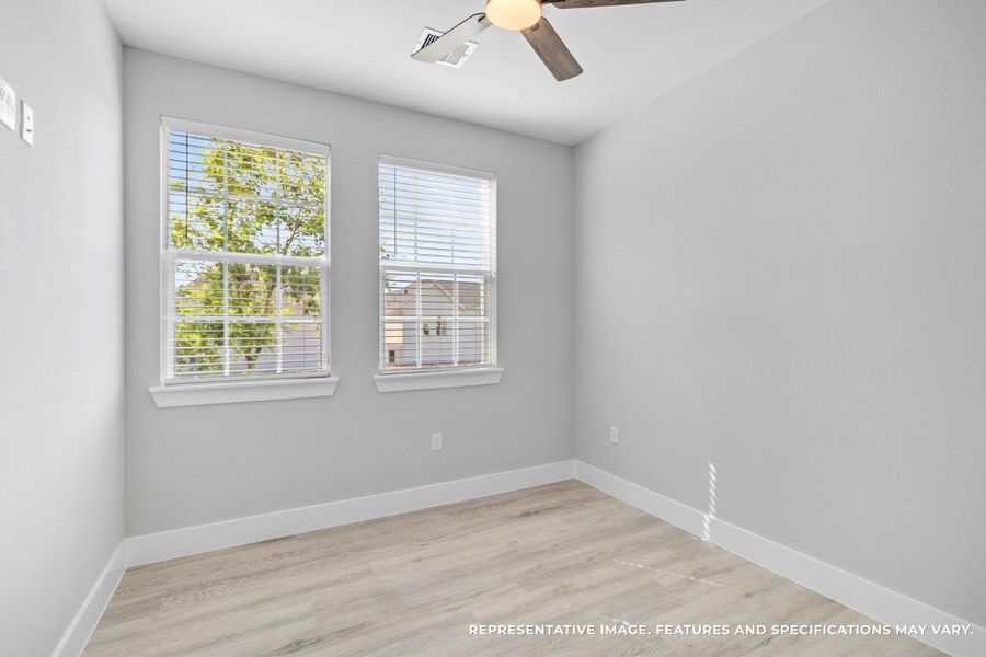 Your secondary bedroom feels bright and comfortable, the perfect retreat for guests, a home office, or a creative space that adapts to your needs.