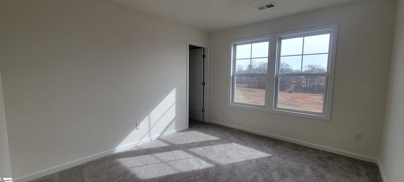 Spacious, unfurnished interior of a new home in Halton Oaks, Spartanburg (Image 15).