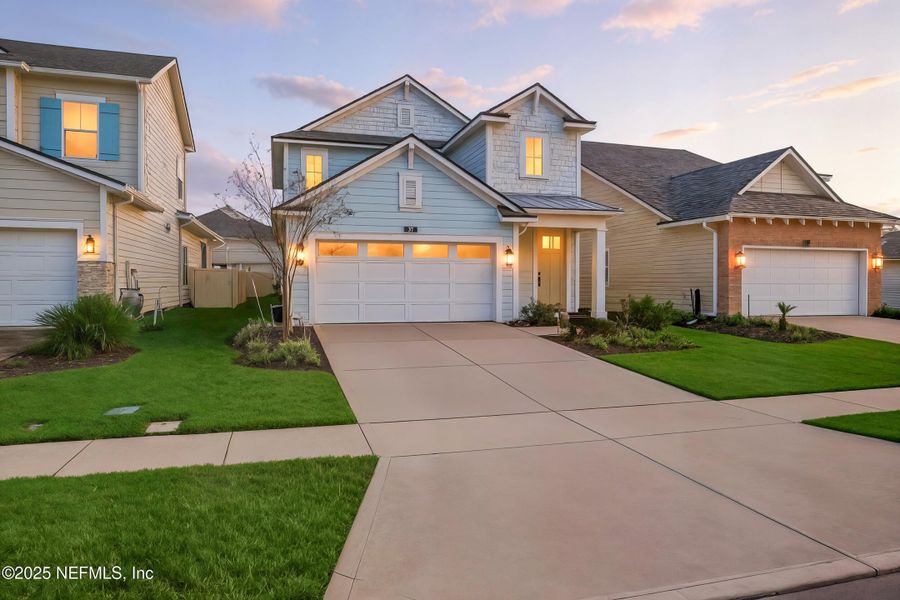 Front exterior of a new home in , Ponte Vedra, FL, highlighting curb appeal (Image 1).