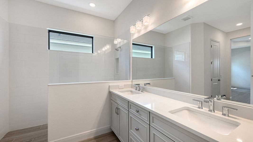 Furnished interior view inside a new home in Palm Grove Real Estate and Homes for Sale in Lakewood Ranch, FL - Neal Communities, Bradenton (Image 10).