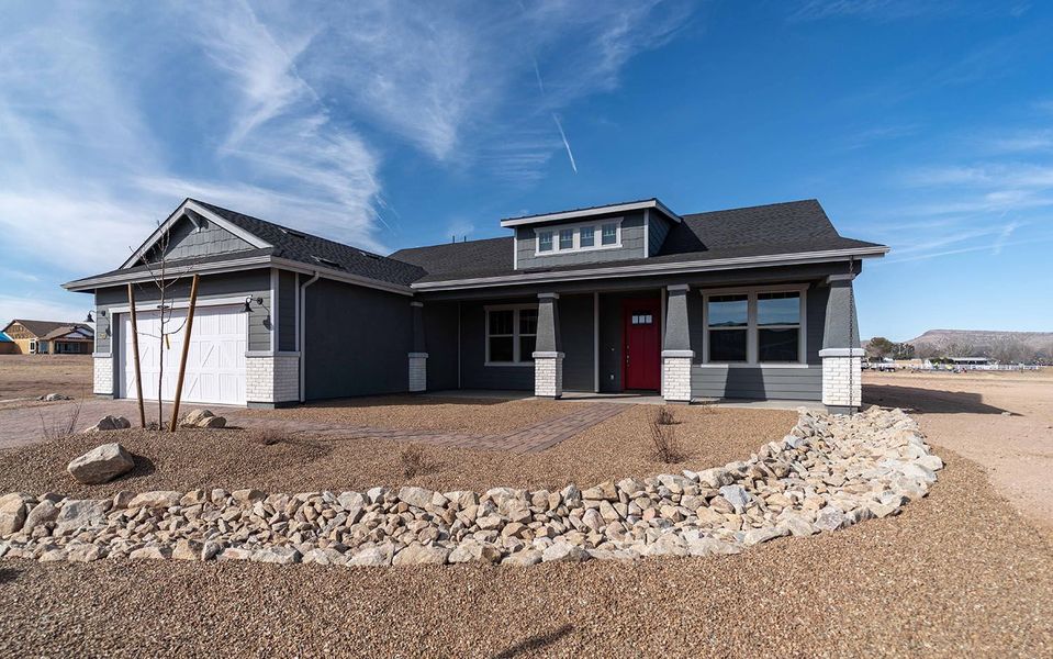 Front exterior of a new home in Heritage Pointe, Chino Valley, AZ, highlighting curb appeal (Image 2).