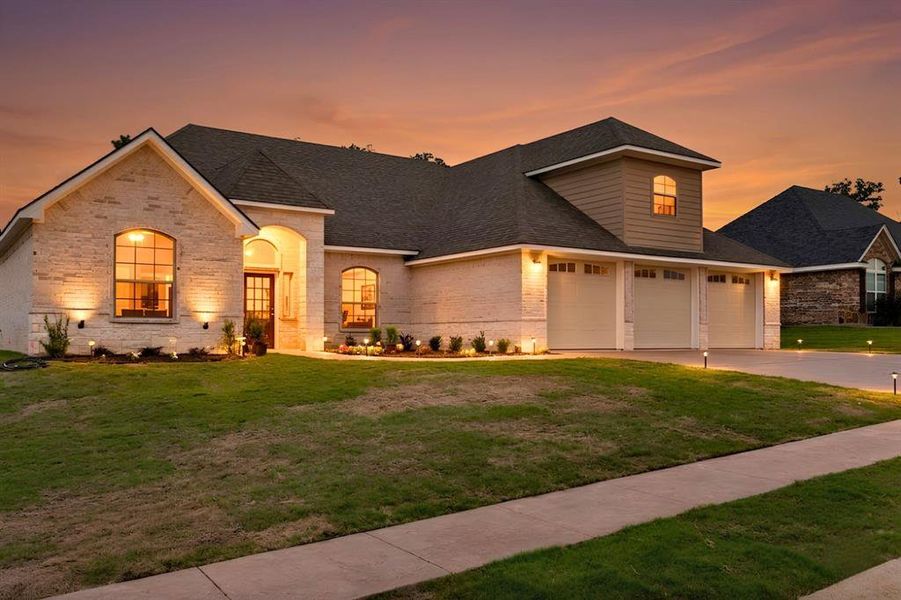 Front exterior of a new home in , Lindale, TX, highlighting curb appeal (Image 28).