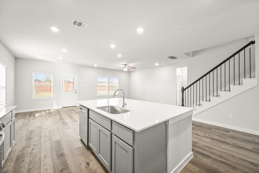 Furnished interior view inside a new home in Sunterra, Katy (Image 9).