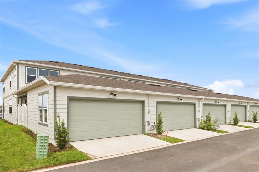 Front exterior of a new home in , Orlando, FL, highlighting curb appeal (Image 19). Front exterior of a new home in , Orlando, FL, highlighting curb appeal (Image 19).