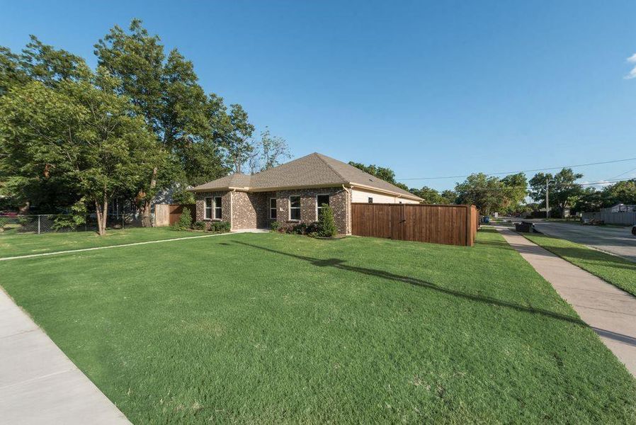 View of front of house with a front yard