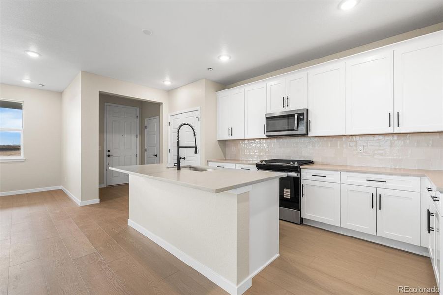 Furnished interior view inside a new home in Barefoot Village, Longmont (Image 6).