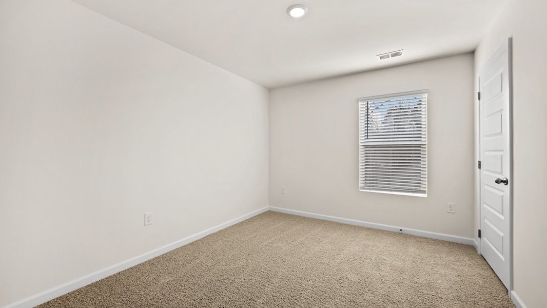 Representative unfurnished interior of a home built from the Salisbury by D.R. Horton in Inverness at Sugarloaf, Lawrenceville (Image 23).
