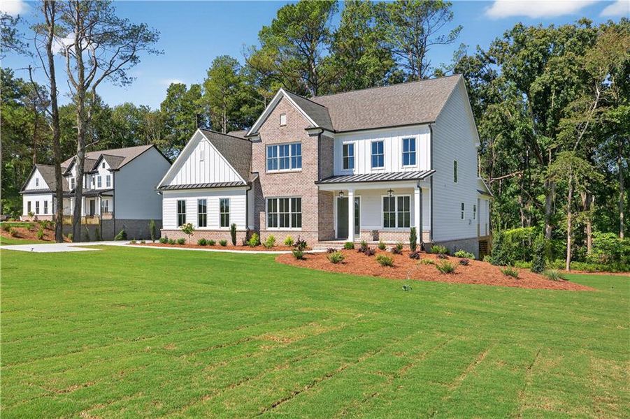 Front exterior of a new home in , Cumming, GA, highlighting curb appeal (Image 32).