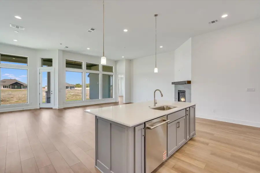 Furnished interior in a model home at Burnet Hilltop Estates in Cedar Park (Image 25).