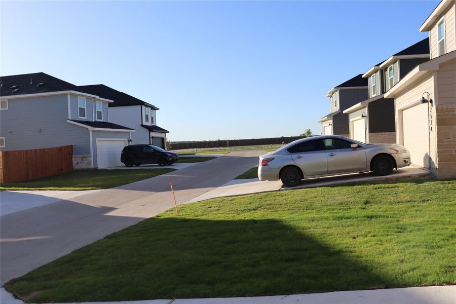 A new construction community featuring modern homes with attached garages.