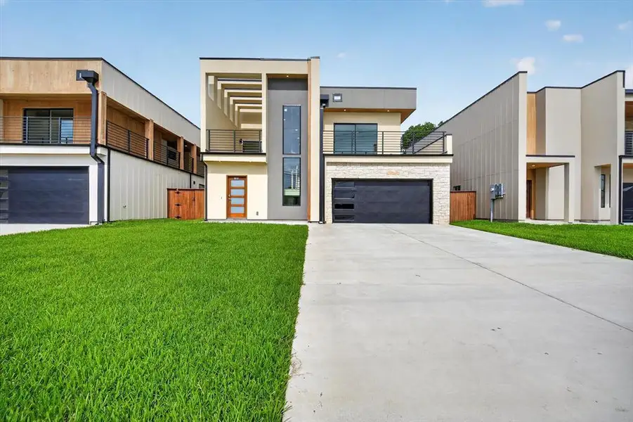 Front exterior of a new home in , Irving, TX, highlighting curb appeal (Image 2). Front exterior of a new home in , Irving, TX, highlighting curb appeal (Image 2).