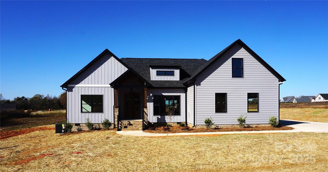 Front exterior of a new home in , Salisbury, NC, highlighting curb appeal (Image 1).