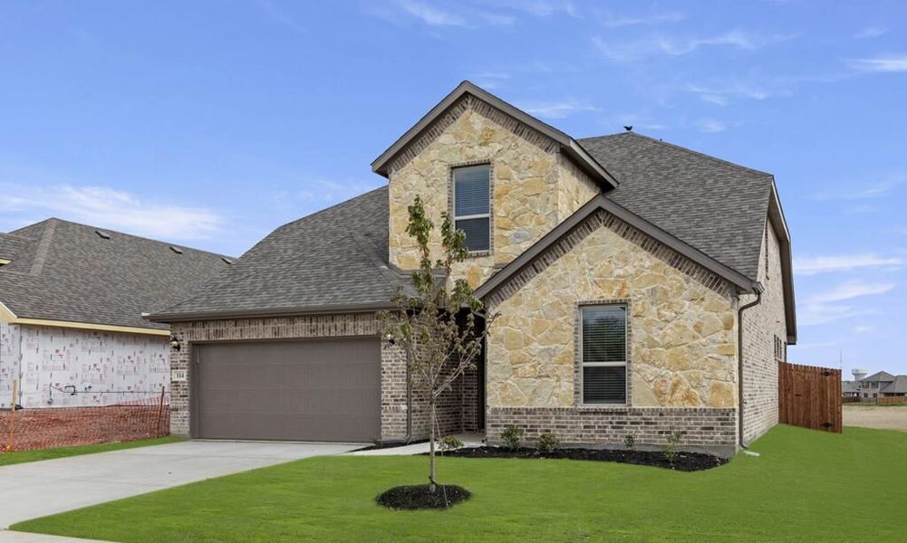 Representative exterior photo of a completed home built from the Brighton by Impression Homes in Arcadia Trails, Balch Springs, TX (Image 2).