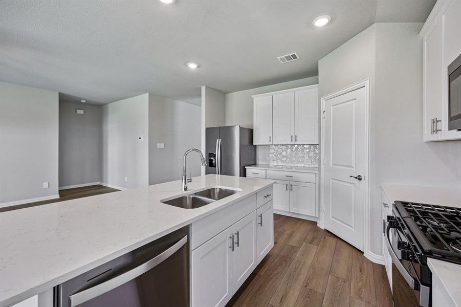 Furnished interior view inside a new home in Lakehaven - Signature Series, Farmersville (Image 9).