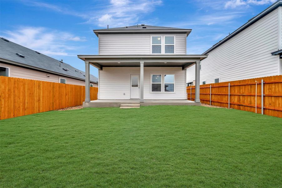 Exterior details and patio area of a home in Heritage, Dripping Springs (Image 20).