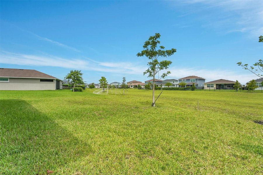Front exterior of a new home in , Loxahatchee, FL, highlighting curb appeal (Image 1).
