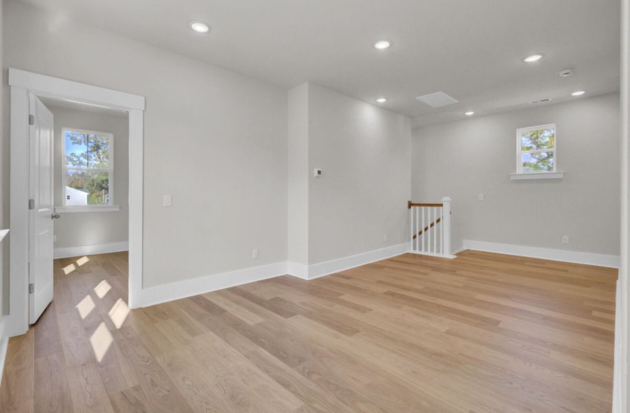 Spacious, unfurnished interior of a new home in Indigo Grove Single Family Homes, Johns Island (Image 34).