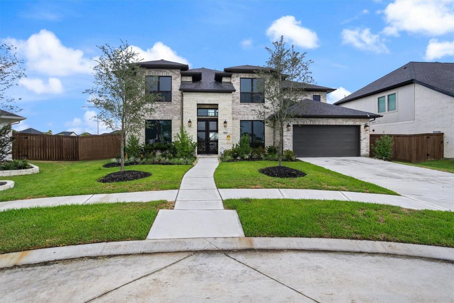 Impressive two-story exterior with 3-car garage