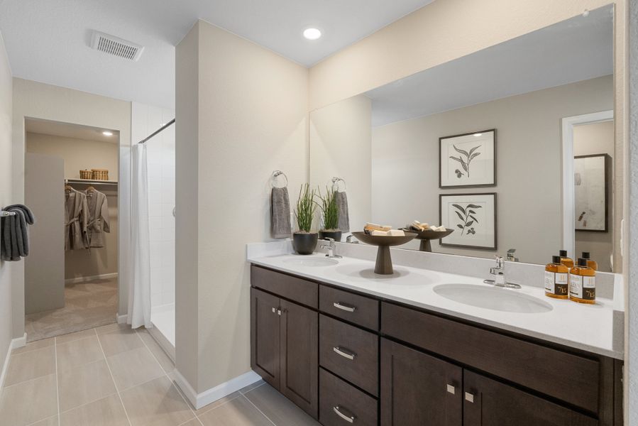 Representative furnished interior of a home built from the 4005 by Risewell Homes in Harvest Crossing, Aurora (Image 10).
