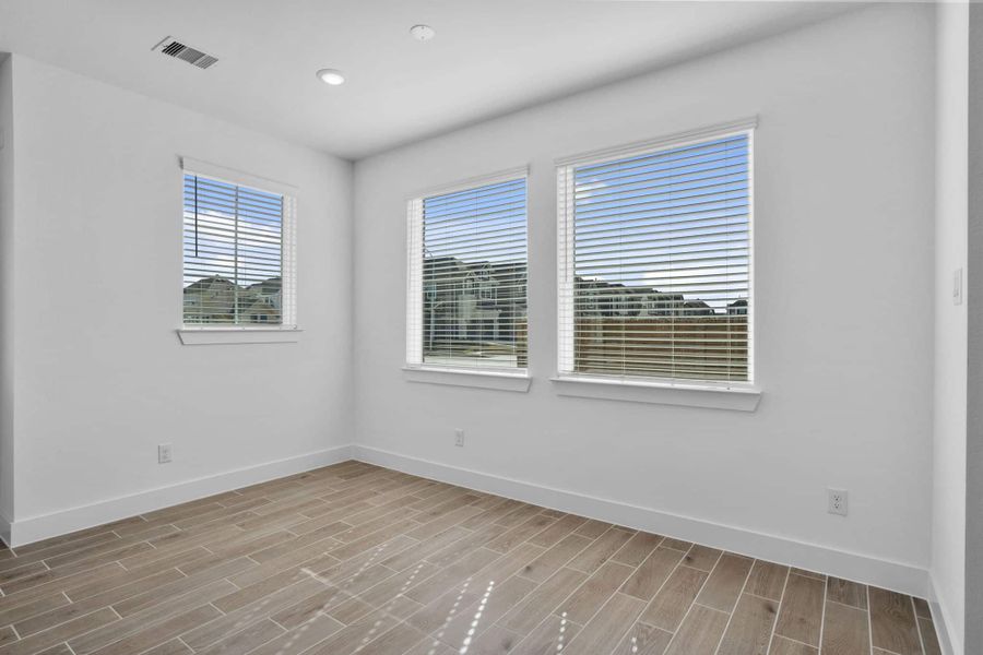 Spacious, unfurnished interior of a new home in Meridiana, Manvel (Image 17).