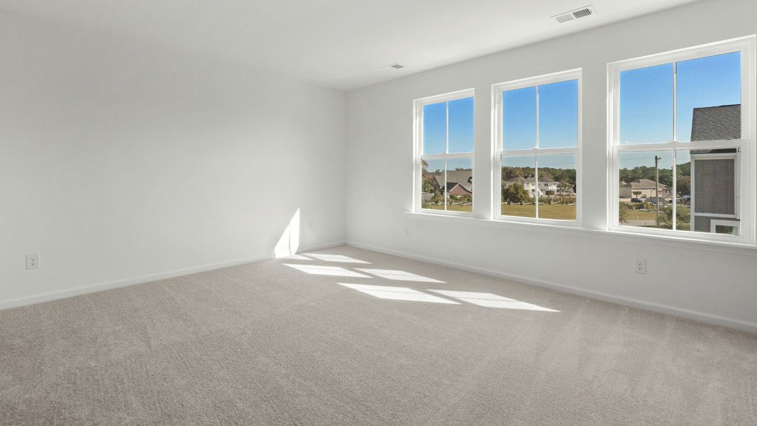Furnished interior view inside a new home in Seabreeze Crossing, Little River (Image 15).