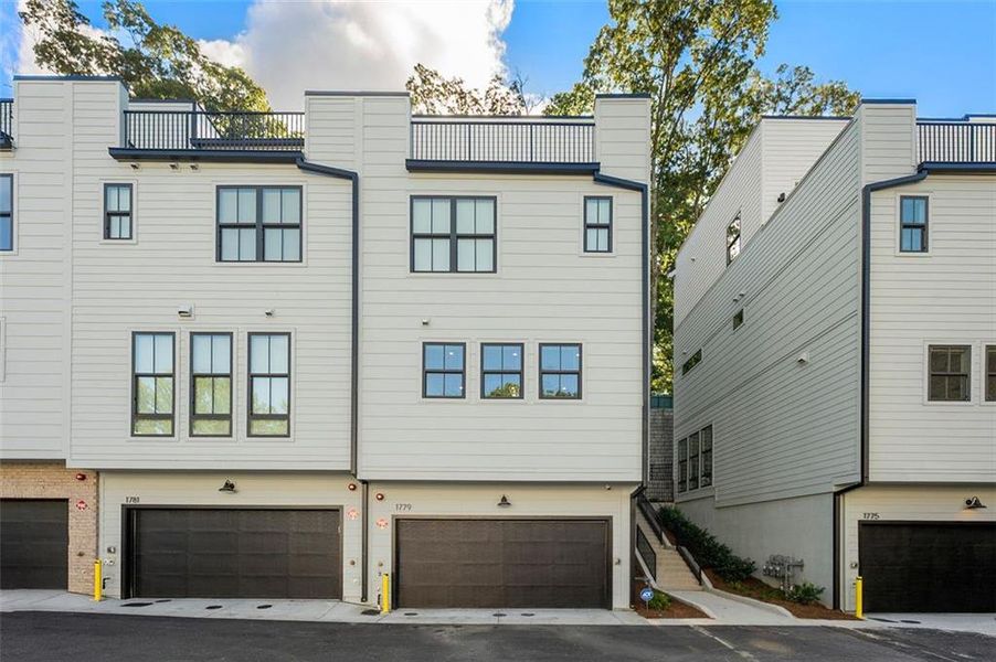 Front exterior of a new home in , Atlanta, GA, highlighting curb appeal (Image 1).