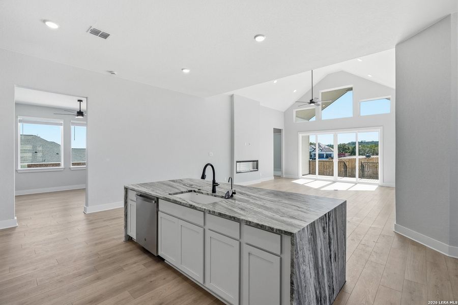 Furnished interior view inside a new home in Potranco Oaks, Castroville (Image 10).