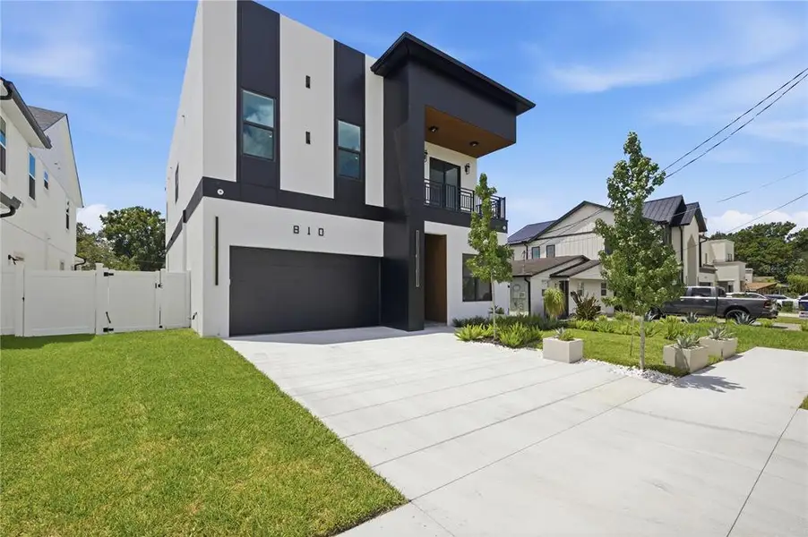 Front exterior of a new home in , Tampa, FL, highlighting curb appeal (Image 1). Front exterior of a new home in , Tampa, FL, highlighting curb appeal (Image 1).