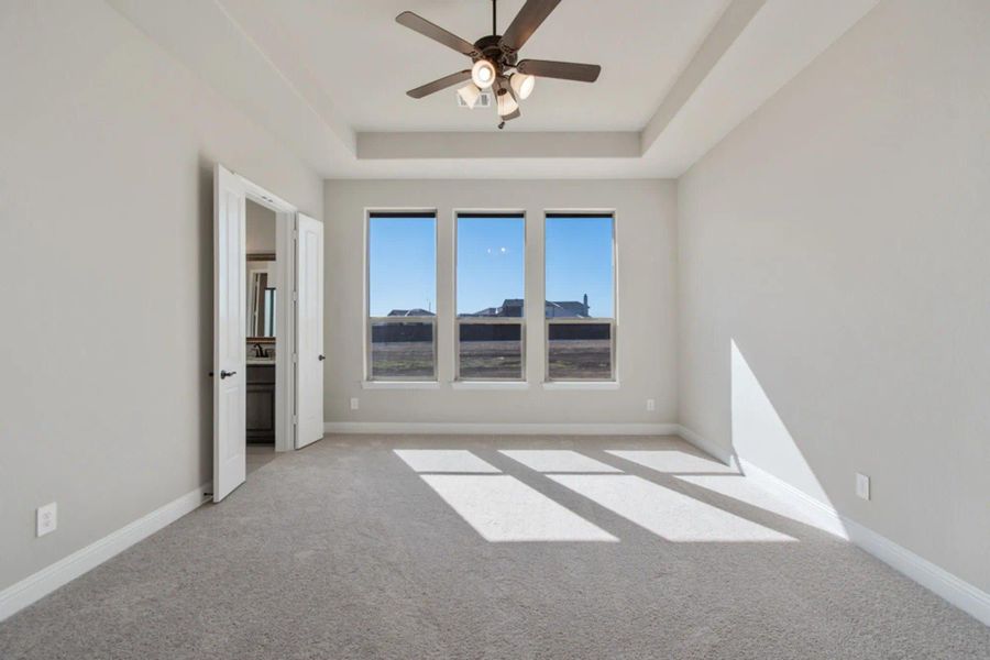 Primary Bedroom | Concept 2586 at Hidden Creek Estates in Van Alstyne, TX by Landsea Homes