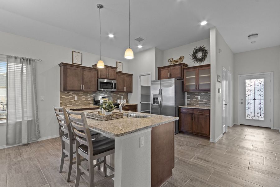Representative furnished interior of a home built from the Meadow-1930SSC by Saratoga Homes in Paseo Del Este, El Paso (Image 5).