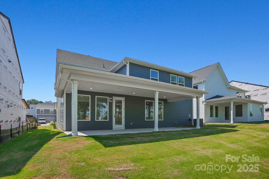 Front exterior of a new home in Cannon Run, Concord, NC, highlighting curb appeal (Image 23). Front exterior of a new home in Cannon Run, Concord, NC, highlighting curb appeal (Image 23).