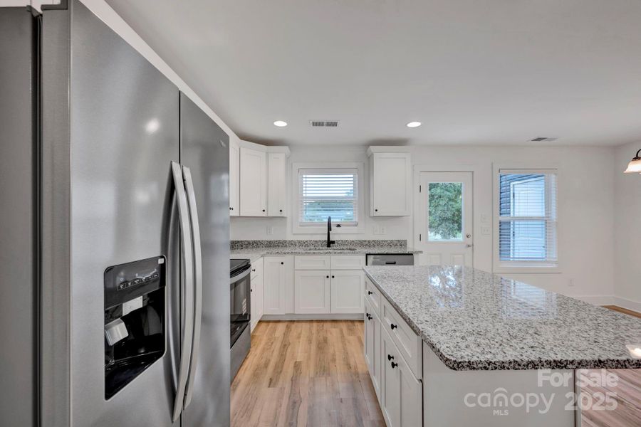 Furnished interior view inside a new home in , Concord (Image 13).