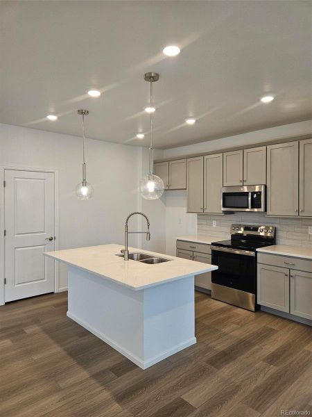 Furnished interior view inside a new home in The Cottages Collection at Ridgeline Vista, Brighton (Image 7).