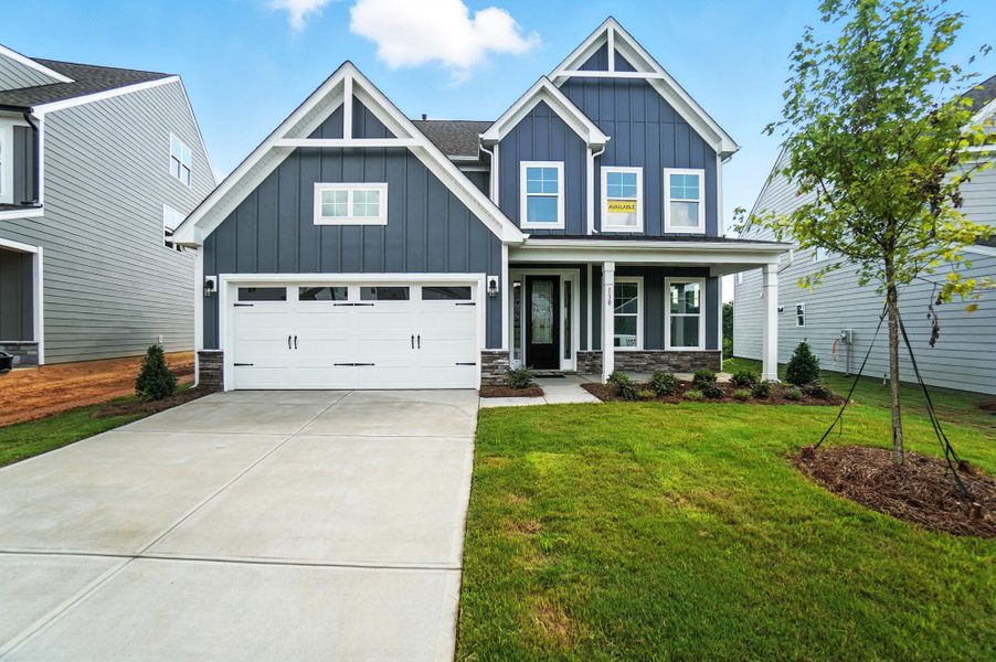 Front exterior of a new home in Summerlin, Mooresville, NC, highlighting curb appeal (Image 1). Front exterior of a new home in Summerlin, Mooresville, NC, highlighting curb appeal (Image 1).