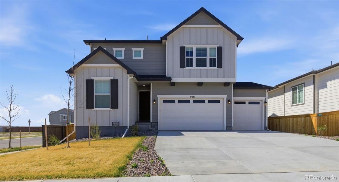Front exterior of a new home in Crossway at Second Creek, Commerce City, CO, highlighting curb appeal (Image 1). Front exterior of a new home in Crossway at Second Creek, Commerce City, CO, highlighting curb appeal (Image 1).