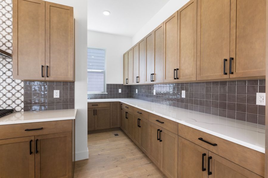 Representative furnished interior of a home built from the Journey Series - Varra by Brightland Homes in Dillon Pointe - Skyview, Broomfield (Image 9).